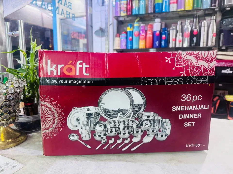 Kraft Snehanjali 36-piece stainless dinner set on the store counter